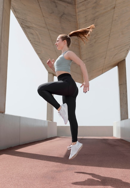 Beautiful woman exercising outdoors