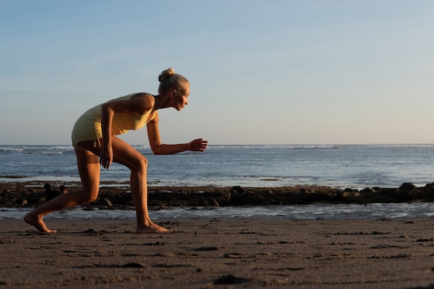 Free Photo beautiful woman jogging on the beach. bali