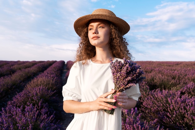 Free Photo beautiful woman in  lavender field background