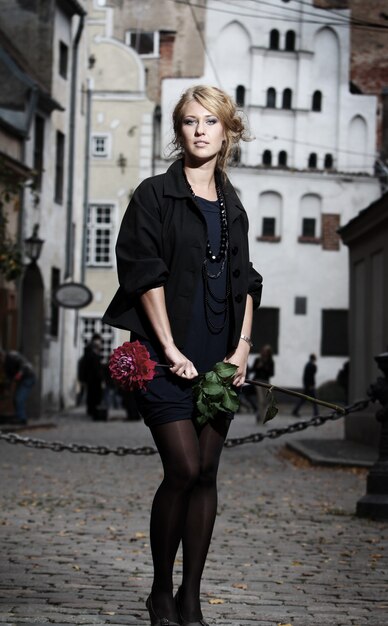 Beautiful woman on the old city street