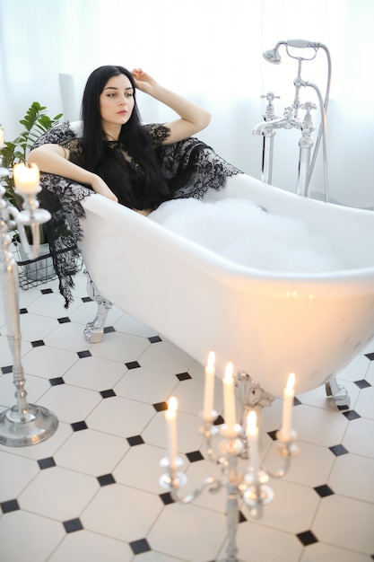 Free photo beautiful woman posing at home in bathroom