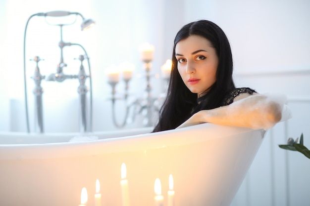 Beautiful woman posing at home in bathroom