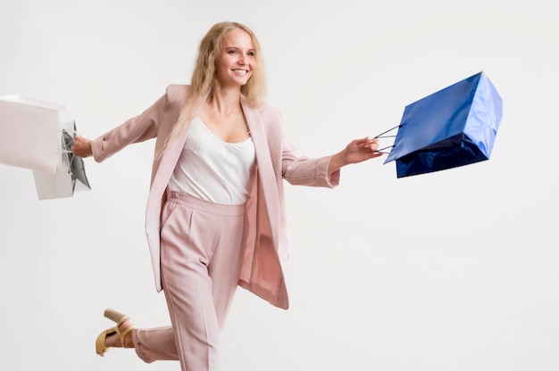 Beautiful woman posing with shopping bags