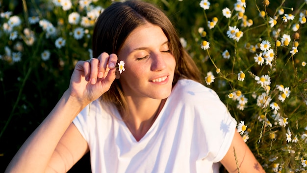 Free Photo beautiful woman relaxing in nature