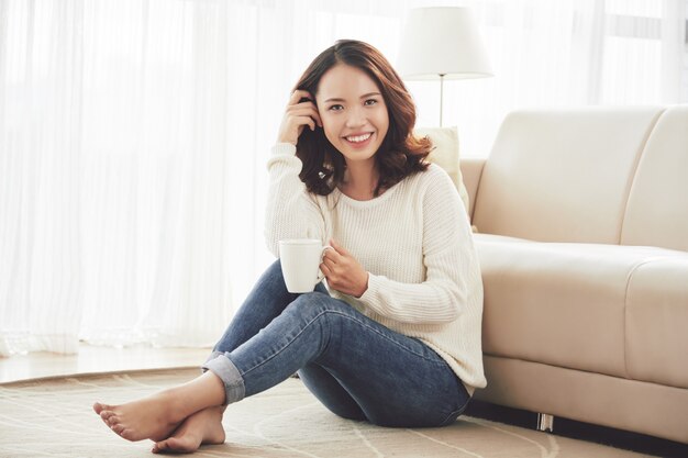 Beautiful woman resting at home