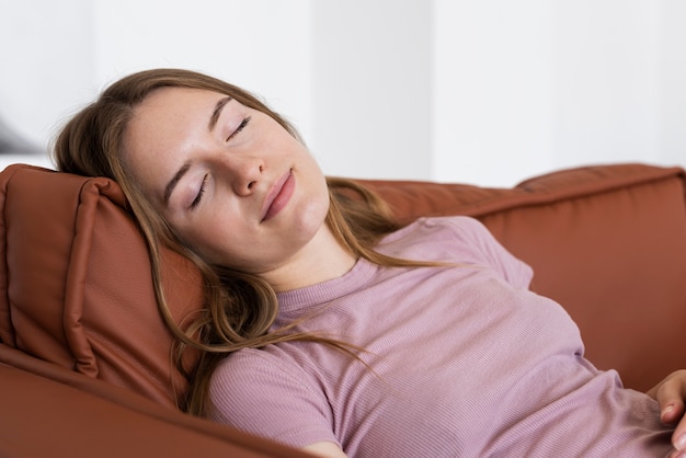 Beautiful woman sleeping on the couch