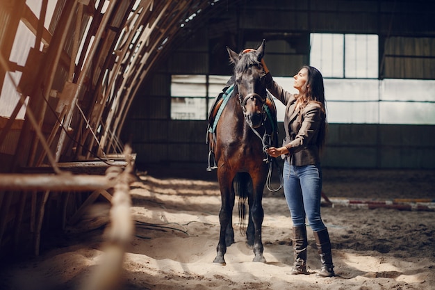 Beautiful woman spend time with a horse