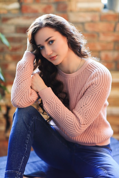 Free photo beautiful woman in a sweater