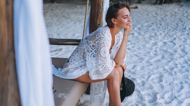 Free Photo beautiful woman in swim wear by the ocean