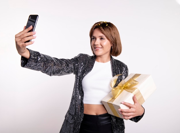 Beautiful woman taking a selfie