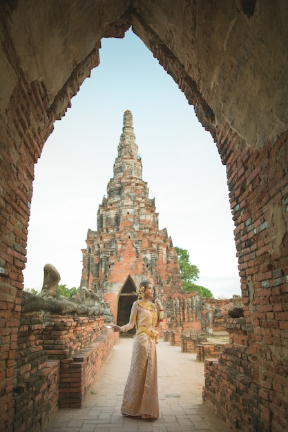 Beautiful woman in Thai old traditional costume, portrait at the ancient Ayutthaya temple