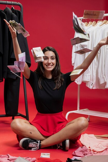 Beautiful woman throwing money on the floor