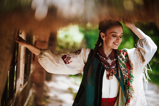 Free Photo beautiful woman in a traditional ukrainian dress smiles