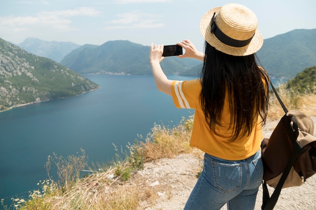 Beautiful woman traveling alone in montenegro