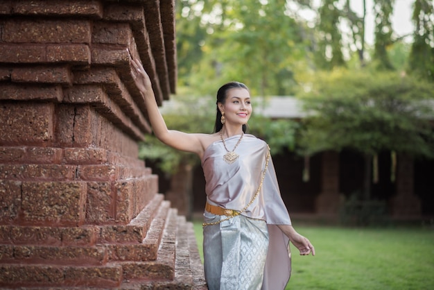 Beautiful Woman wearing typical Thai dress