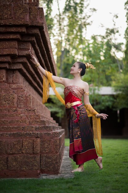 Beautiful Woman wearing typical Thai dress