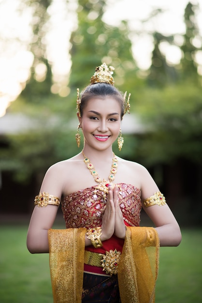 Beautiful Woman wearing typical Thai dress