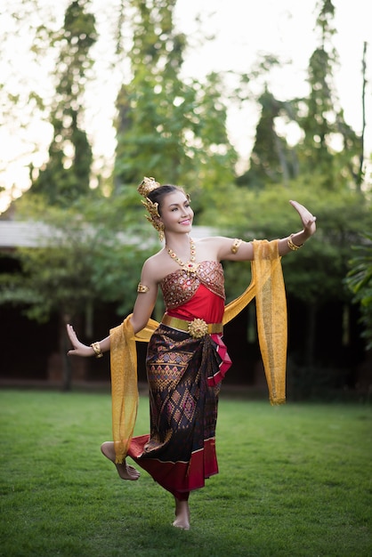 Free photo beautiful woman wearing typical thai dress