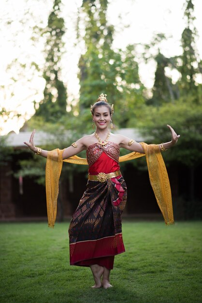 Beautiful Woman wearing typical Thai dress