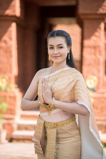 Beautiful Woman wearing typical Thai dress