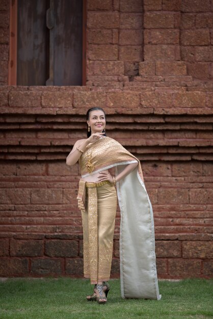 Beautiful Woman wearing typical Thai dress