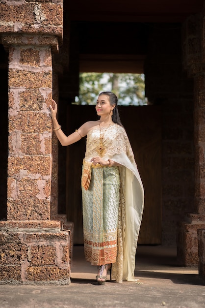 Free photo beautiful woman wearing typical thai dress