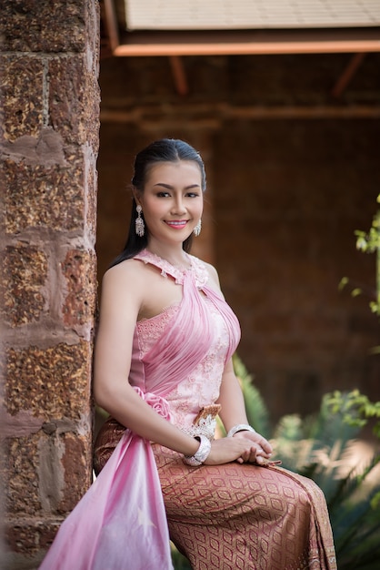 Beautiful Woman wearing typical Thai dress