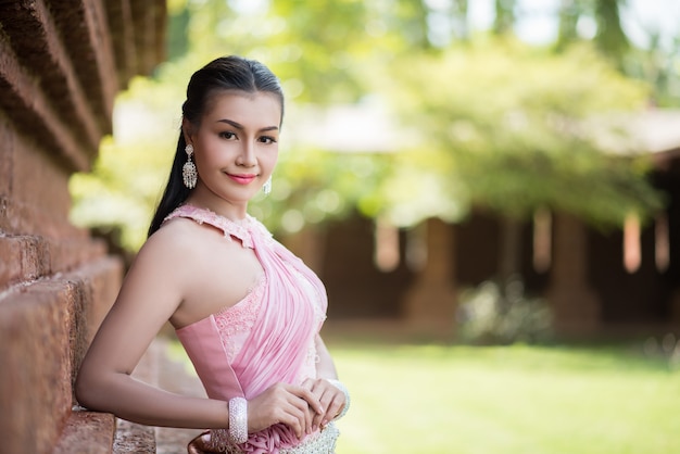 Beautiful Woman wearing typical Thai dress