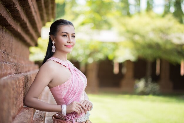 Beautiful Woman wearing typical Thai dress