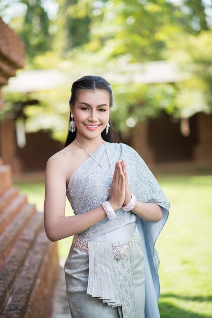 Beautiful Woman wearing typical Thai dress