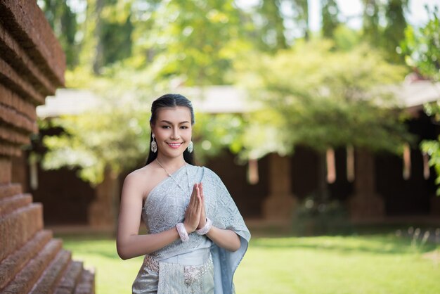 Beautiful Woman wearing typical Thai dress