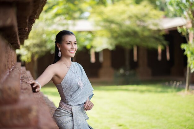 Beautiful Woman wearing typical Thai dress