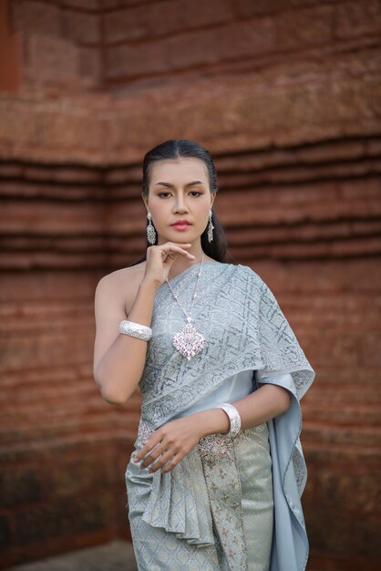 Beautiful Woman wearing typical Thai dress