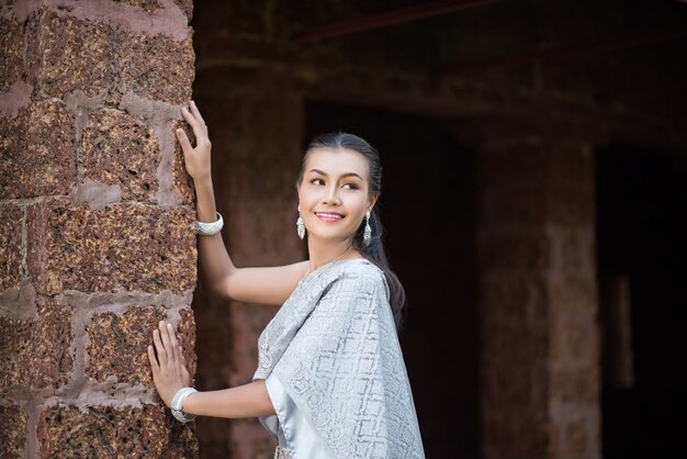 Beautiful Woman wearing typical Thai dress