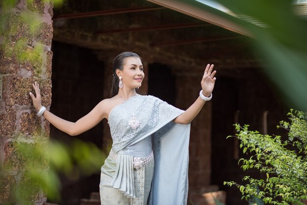 Beautiful Woman wearing typical Thai dress