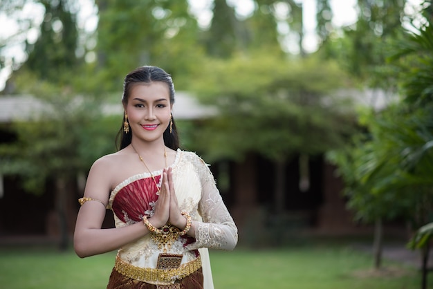 Beautiful Woman wearing typical Thai dress