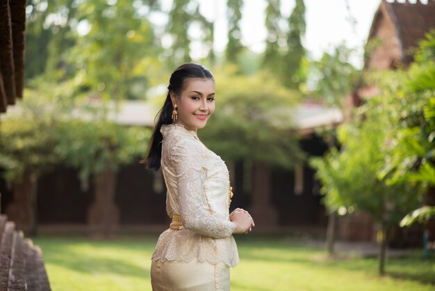 Beautiful Woman wearing typical Thai dress