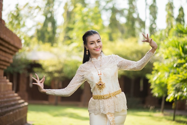 Free photo beautiful woman wearing typical thai dress