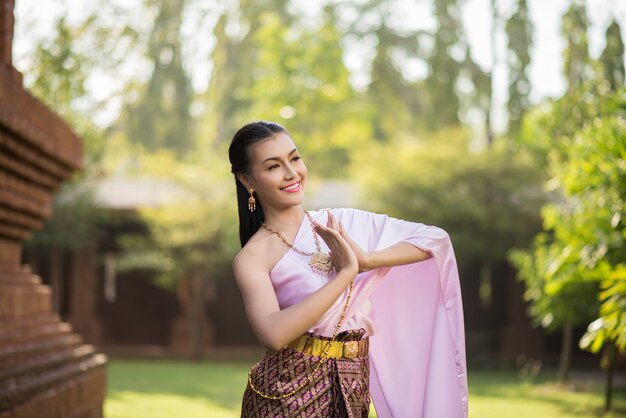 Beautiful Woman wearing typical Thai dress