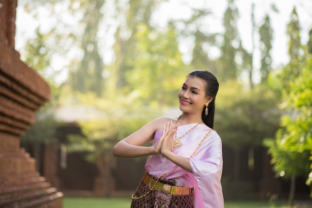 Free photo beautiful woman wearing typical thai dress