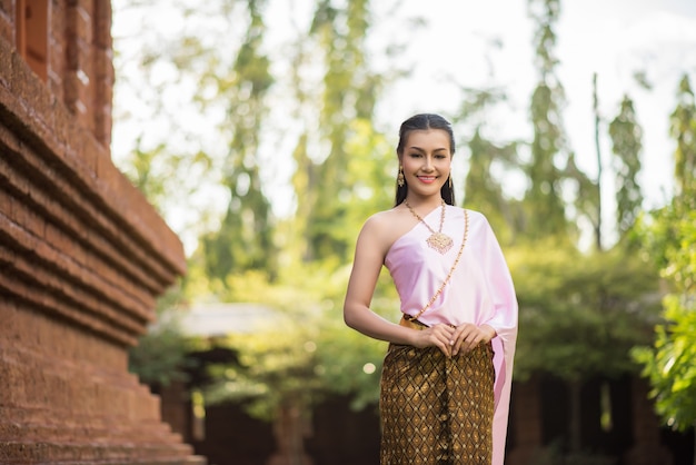 Beautiful Woman wearing typical Thai dress