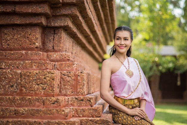 Beautiful Woman wearing typical Thai dress