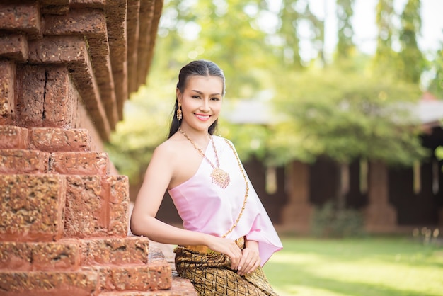 Free photo beautiful woman wearing typical thai dress