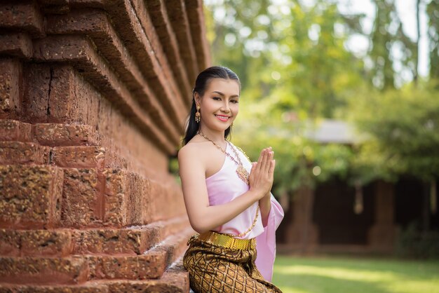 Beautiful Woman wearing typical Thai dress