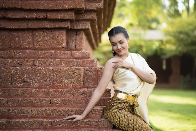 Free photo beautiful woman wearing typical thai dress