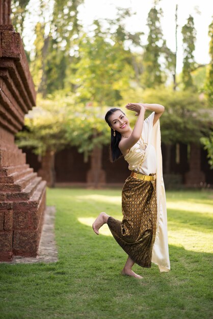 Beautiful Woman wearing typical Thai dress