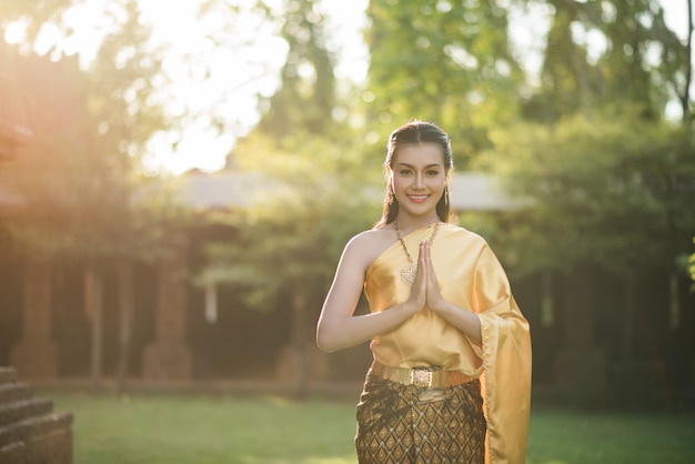 Free photo beautiful woman wearing typical thai dress