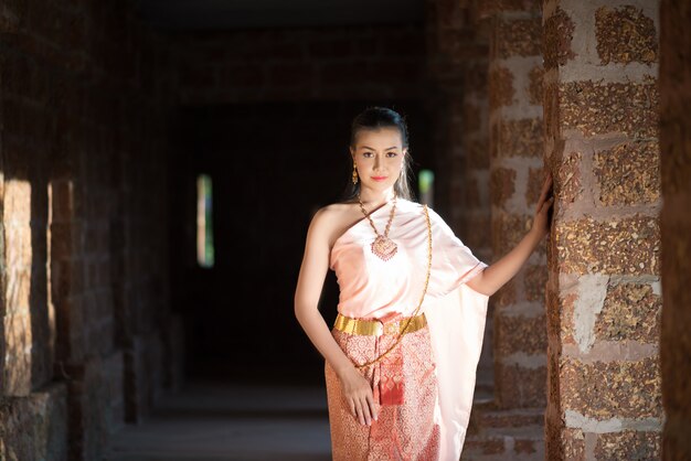 Beautiful Woman wearing typical Thai dress