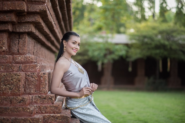 Beautiful Woman wearing typical Thai dress