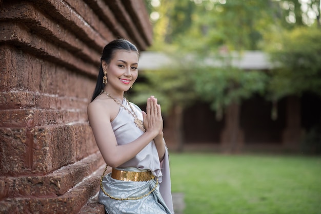 Free photo beautiful woman wearing typical thai dress